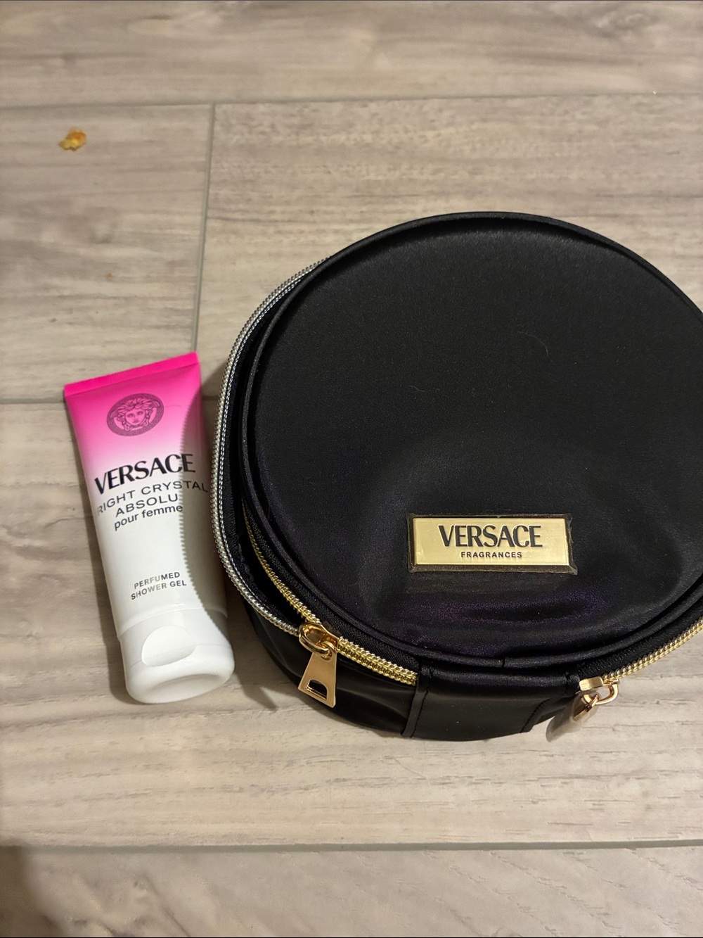 Versace Black Round Travel Case with Pink-to-White Shower Gel